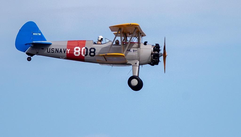 KatiePMcGrady's tweet photo. Archbishop Aymond flew over New Orleans in a World War II-era plane today, blessing the city with holy water from the Jordan River.

The. Church. Is. Alive. And. Thriving. https://t.co/6KAQFfKVwr