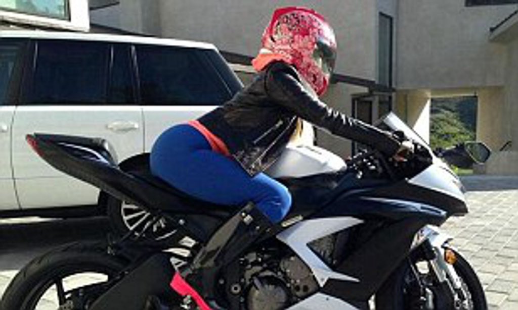 “Young money right here, bike here, throw it up, no high chair”Nicki talks about throwing bikes up: popping a wheelie. She then compares it to a highchair which is a chair babies sit in and are known for throwing up in. It is well known that she has a thing for motorbikes.
