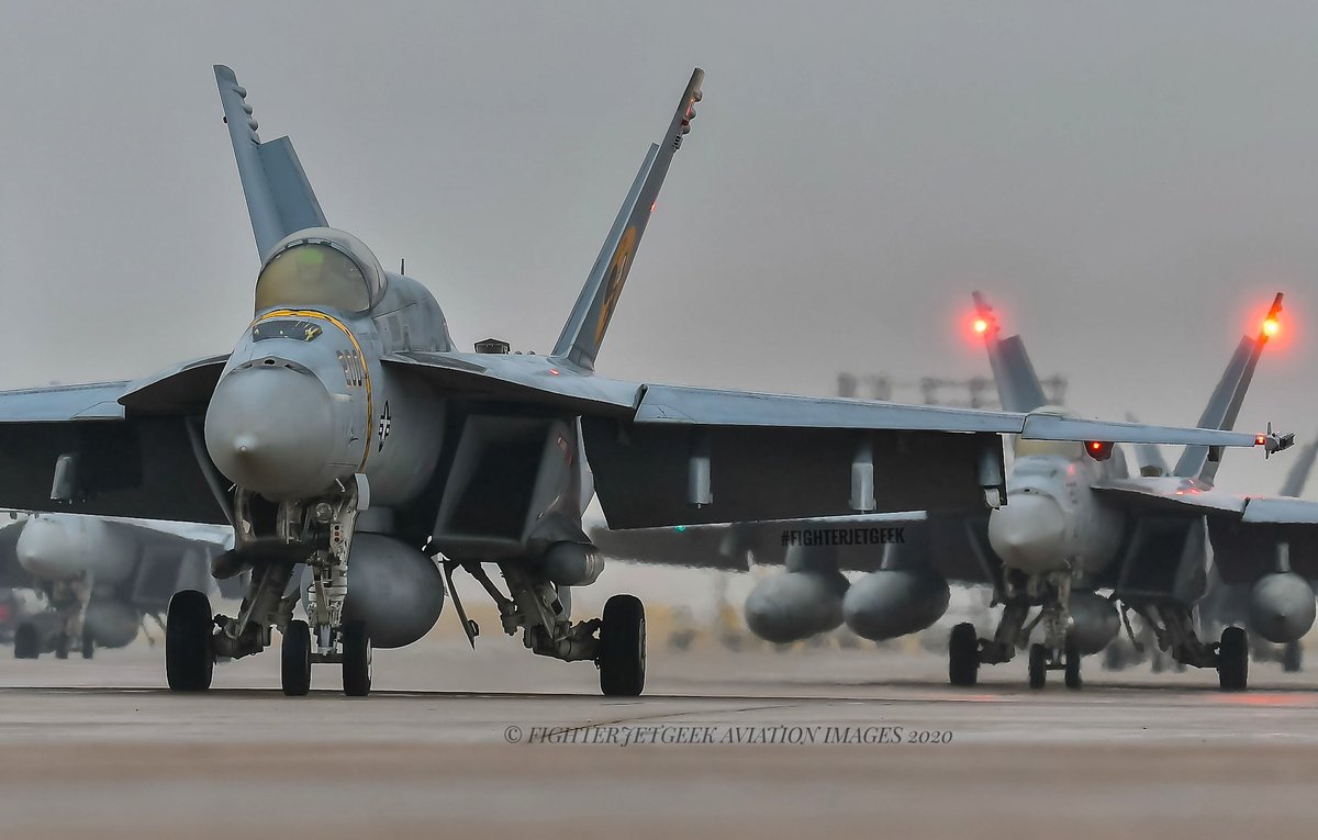fighterjetgeek's tweet photo. For #FighterJetFriday :
'The Nest Begins To Stir'~
Captured in the early morning moments of a seriously IMC day, 12 'Echo' model Super Hornets, from the world famous #Tomcatters of #VFA31, begin to spool up... for the last leg home. #FlyNavy #FighterJetGeek https://t.co/Y3C0Q0k259