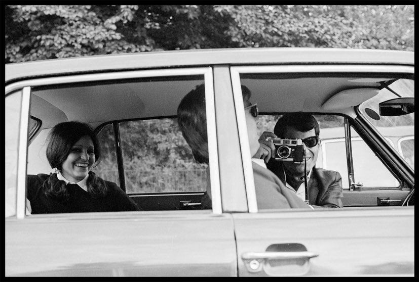 Man with camera. London, 1968.