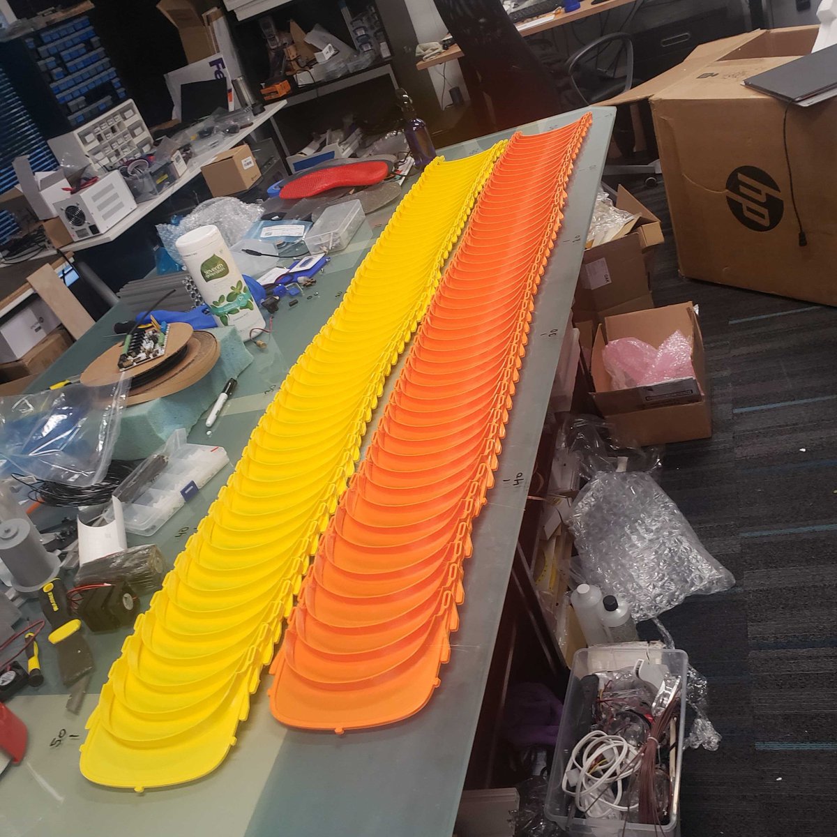 3D Printing guru Brandon Toomey's printer farm has been going now-stop for a week now printing single use head bands for face shields ( #budmen design)