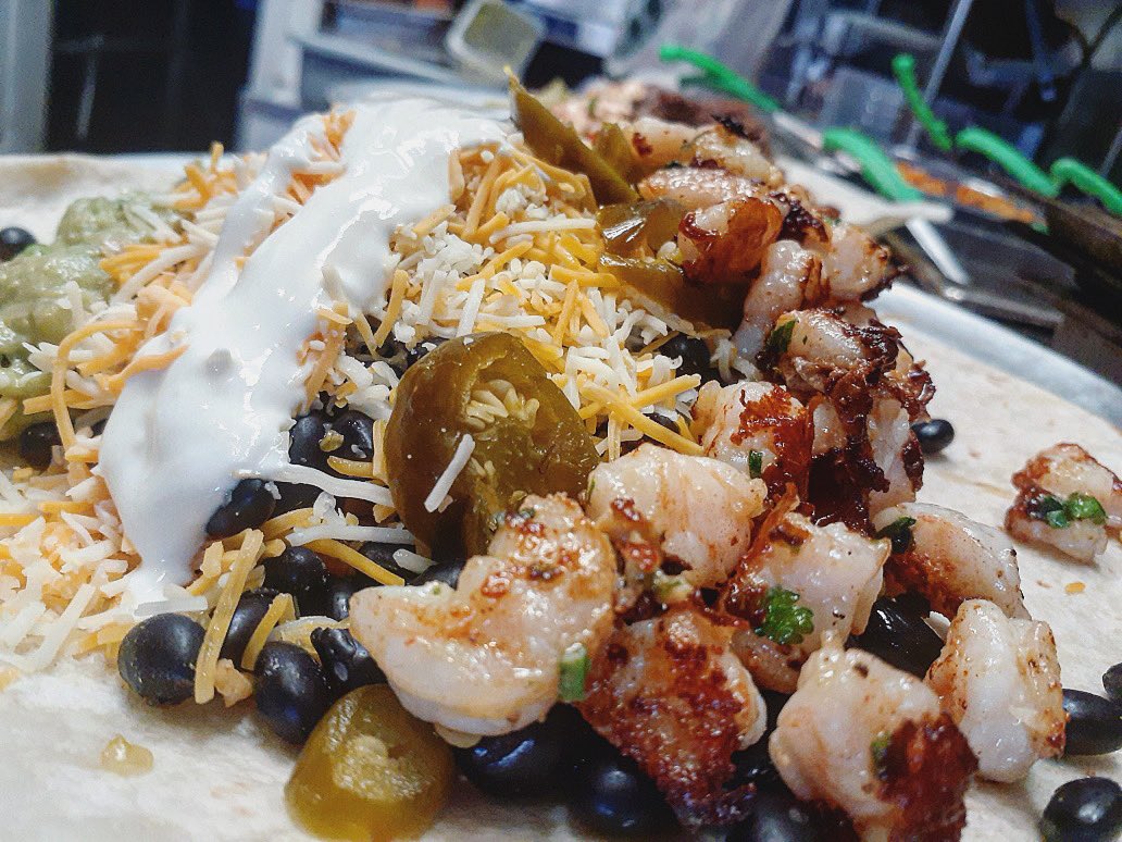 Get our Mission burrito with your choice of fillin! This one has shrimp. Call us or order directly from our site via <a href="/toasttab/">Toast</a> 🌯 🍤 
#wedeliver #queenseats #ridgewood #ediblequeens #nyceats #lockdown #quarantinemeal #socialdistance #foodphoto #foodiegram