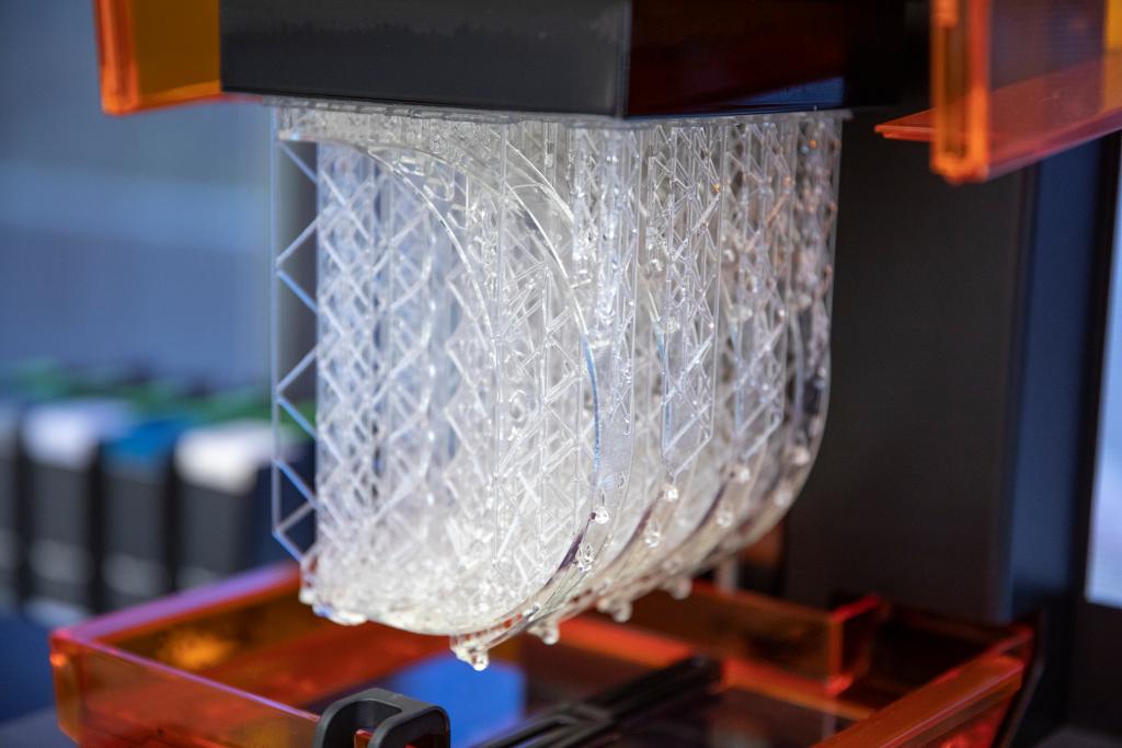 MayoRadiology's tweet image. Dr. @rahmioklu, director, and Joe Mayer, #researchtech, in the #MayoClinicAZ #3DAnatomicModelingLab produced and assembled face shields for staff to use while caring for patients with #COVID19. Many staff across Mayo are working to prevent supply shortages. #3Dprinting