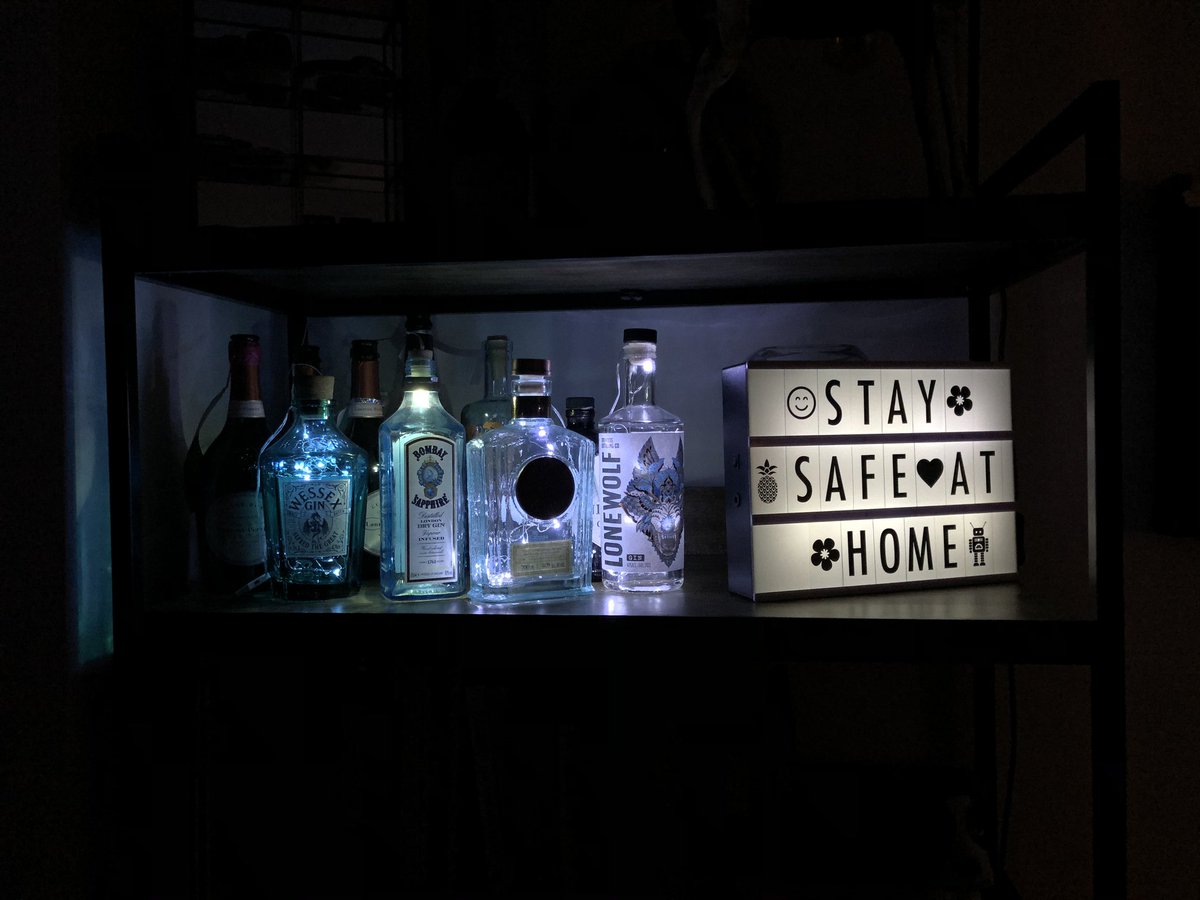 bethtalksalot's tweet photo. My repurposed gin bottle lights have a message for the Bank Holiday weekend... if you can, stay safe at home. Sending huge thanks to all the key workers. https://t.co/NWywcQP9nf