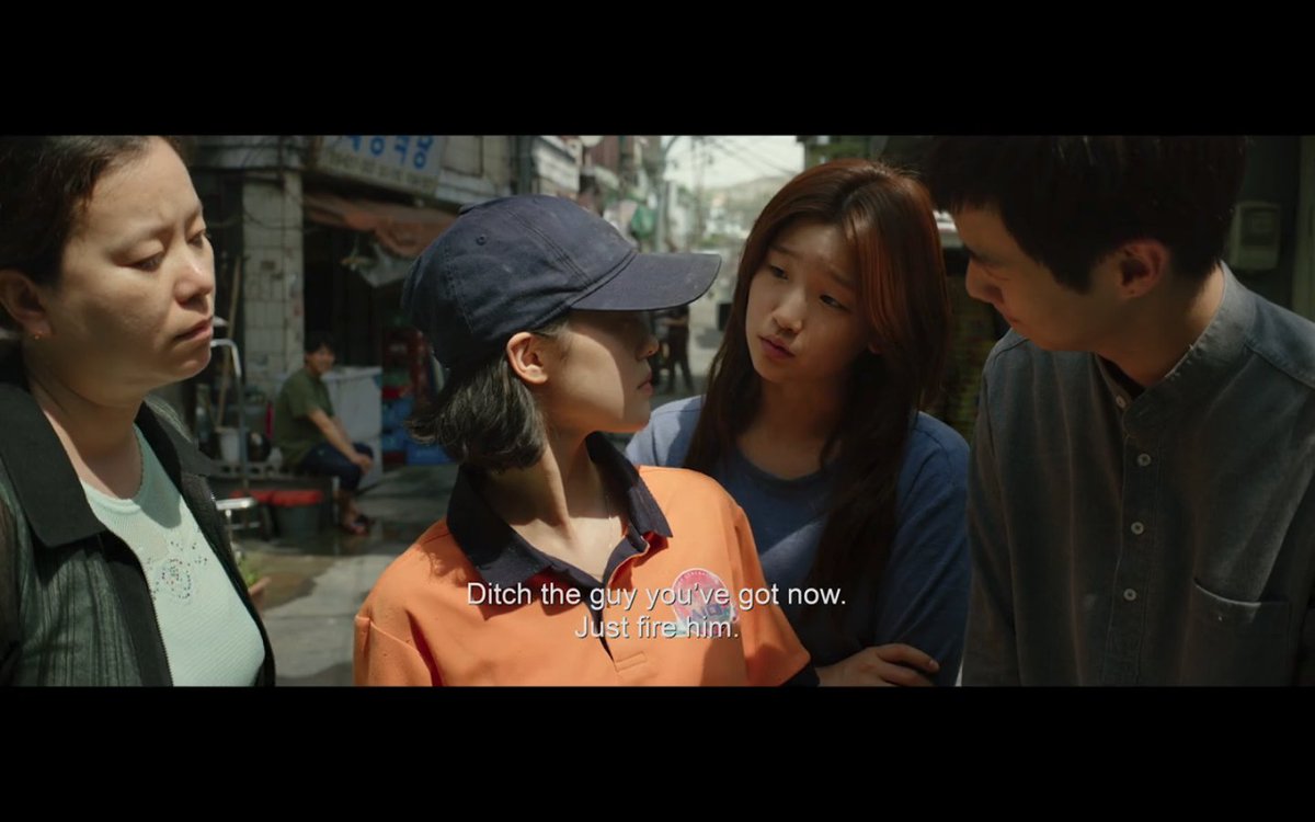 i love this shot of how they're trying to work the pizza lady — using gossip, sweet talking, hustling. it tells you everything you need to know about how they work as a family