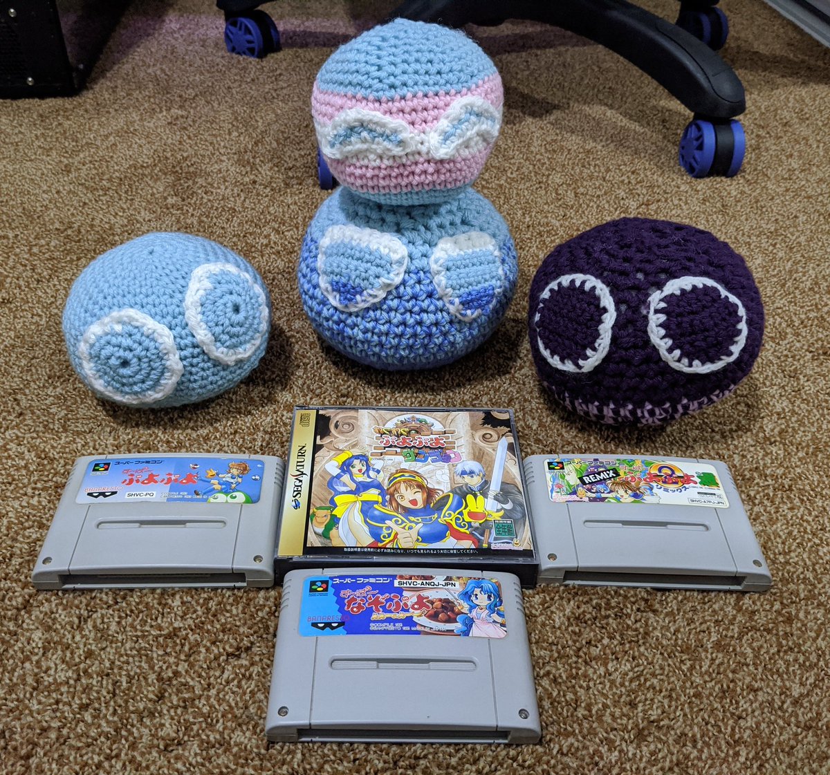 Puyo says trans rights!

Also, got a small pile of Puyo Puyo games in the mail to play over the long weekend!

I've made 4 Puyos now, I need to stop lol. They're really quick and relaxing to crochet tho! I gotta actually get better at Puyo before I make more > .<