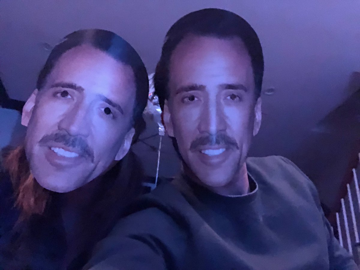 KatieShenot's tweet photo. My cousin and her friends have been watching a new Nicholas Cage movie together every night for the past 23 nights on Zoom. In case you were wondering, yes....they all wear Nic masks #nicholascage #quarantinemagic https://t.co/WbElUznnos
