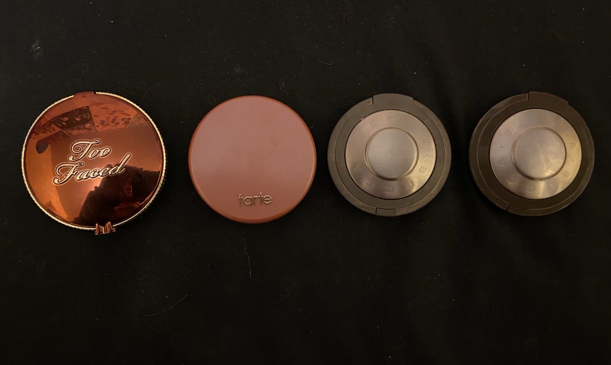 {contour + highlight} left to right: too faced chocolate gold soleil bronzer, tarte amazonian clay blush, becca champagne pop highlighter, becca moonlight highlighter