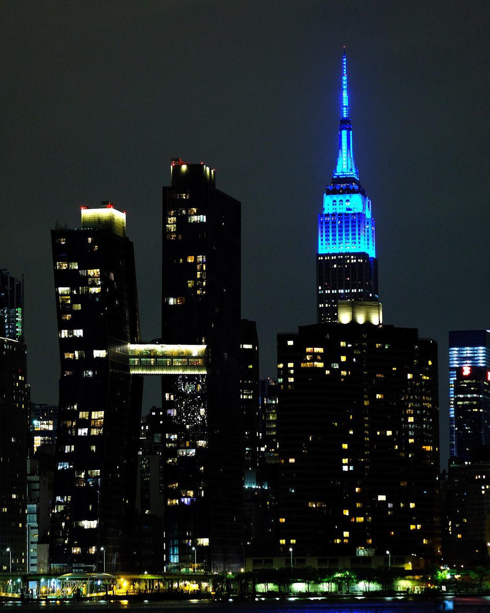 enews's tweet photo. Cities around the world are shining bright for our brave healthcare heroes. 💙 https://t.co/sABsWGFTnH
