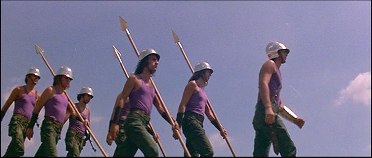 Roman soldiers in lavender tanks and jeans