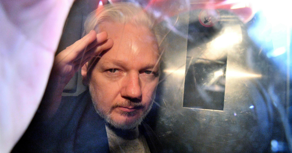 wikileaks's tweet photo. One year ago: #JulianAssange was illegally dragged from asylum and imprisoned in a maximum security prison

His crime: Speaking truth to power
His sentence: If extradited, faces 175+ years in solitary confinement 

Resist the extradition of Julian Assange
#DontExtraditeAssange https://t.co/L9tfEMXQ3n