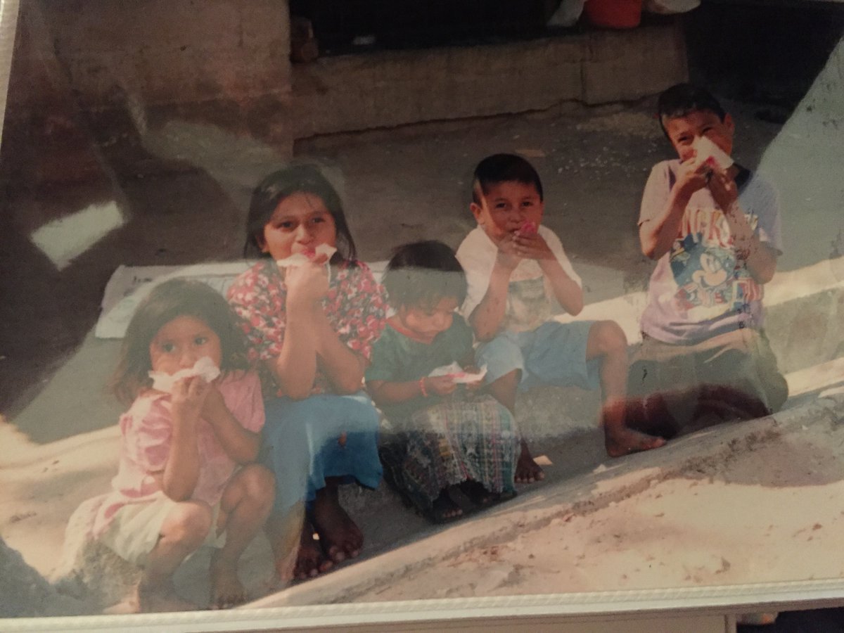 Now I'm on a tangent and I'm going with it. Here are some kids enjoying the taffy we made and that I got 3rd degree burns making. Warning: boiling sugar is hot. (It's a picture of a picture, hence the shadows.)