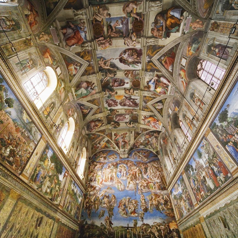 sistine chapel- one of the greatest treasures of the vatican city- famous renaissance building- popes are chosen and crowned there- famous ceiling by michelangelo (the creation of adam)