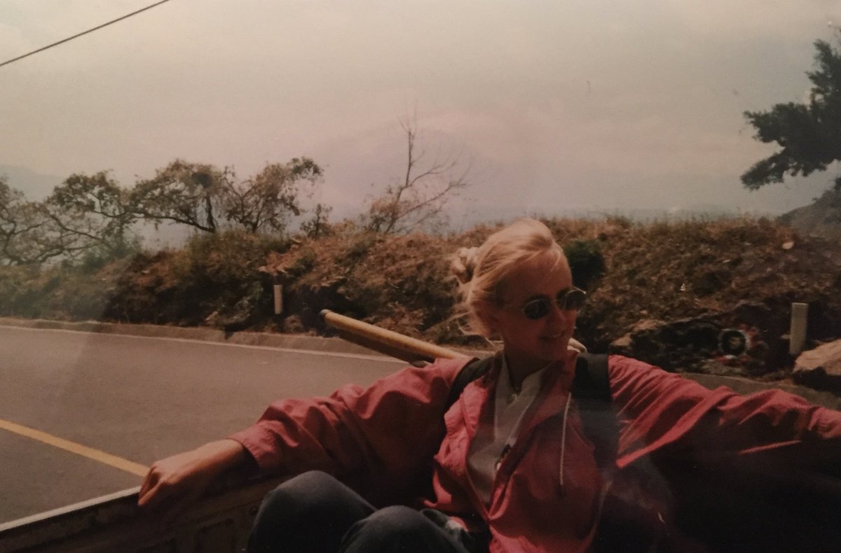 Here I am hitchhiking, backpack in the normal position, circa 1996. This was right before the driver stopped in the middle of nowhere and my friend Stephanie leans over and says, "this is where he kills us." (He didn't kill us.)