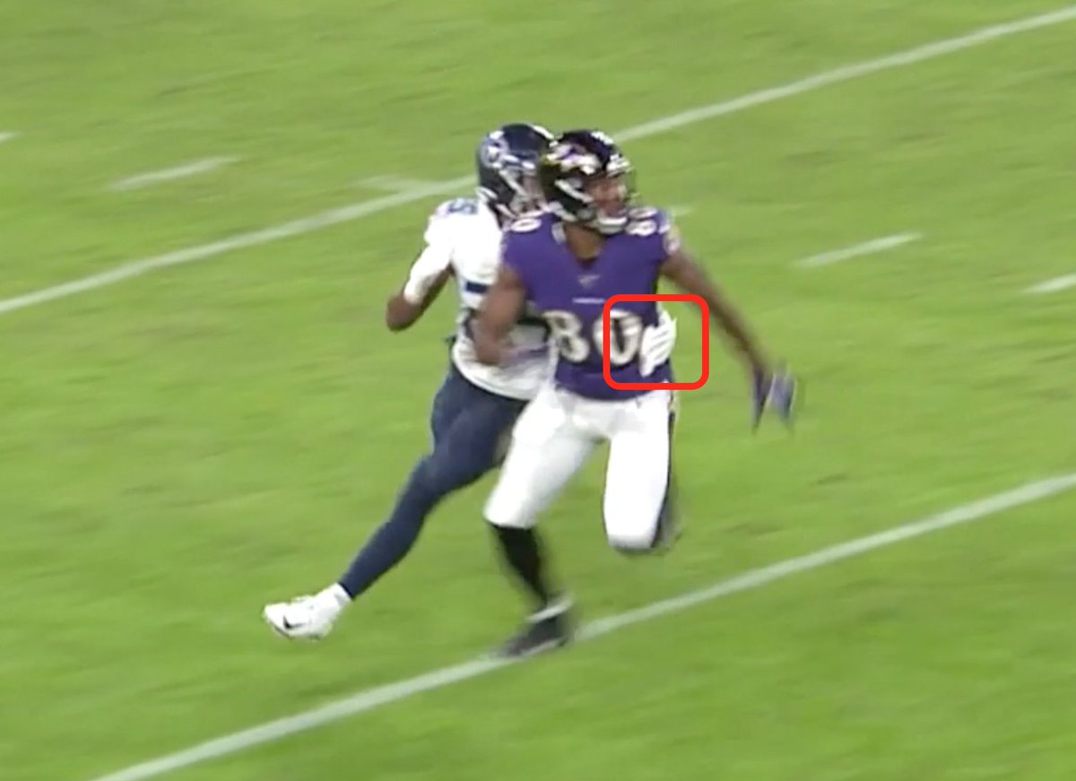 Uses his inside hand to feel where the receiver is while he looks at the ball in the air. When the ball arrives, Adoree lifts his outside arm over the receiver to disrupt the pass. Perfectly timed.