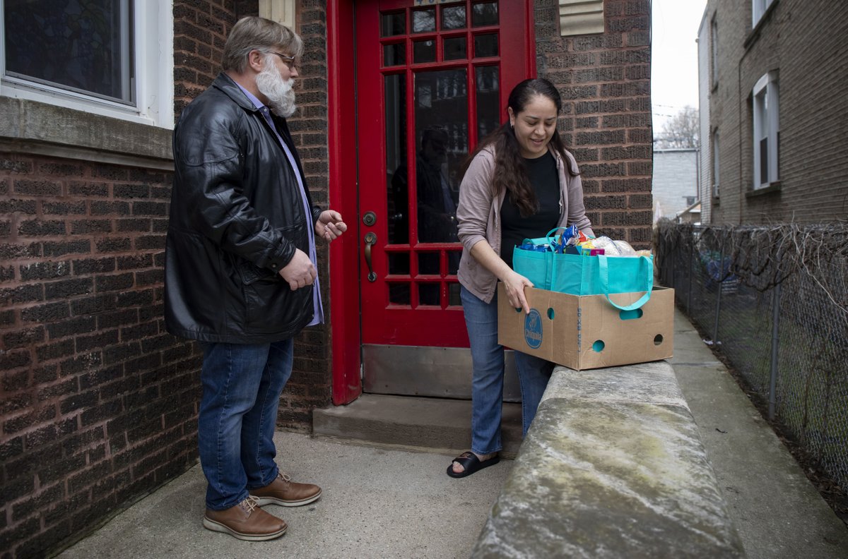 March 11: Photographing the quarantined Vaughn students from outside their windows, and food deliveries to the families. But they are the rare ones staying home