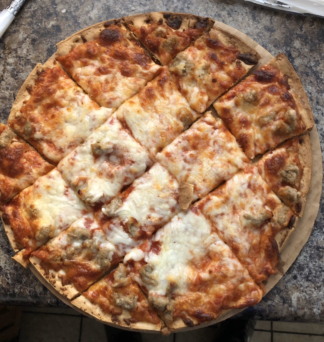 Ty_Weber7's tweet photo. My turn to make lunch today. Had to go with my famous dish. Jacks cheese and sausage 🍕 @IlliniBaseball @DanHartleb https://t.co/1i6MPMaOAw