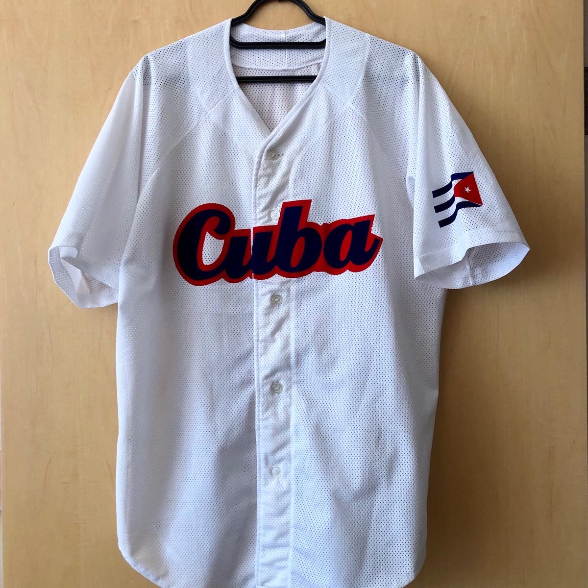 Cuba Home (?) JerseyUnofficial replica When I went to Cuba in 2015, I kept looking for a baseball jersey to take home. The Cuban national team is one of the best in the worldI eventually found one, sold to me very secretively, for reasons to me still unknown #HomeShirts