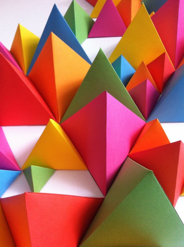 9) Explore the tessellating properties of A-sized paper and create some tetrahedron wall art.For instructions see my  #ArtfulMaths blog post here:  https://www.artfulmaths.com/blog/tetrahedron-wall-art  #3DMaths  #HandsOnMaths  #LockdownMaths  #ArtfulMaths