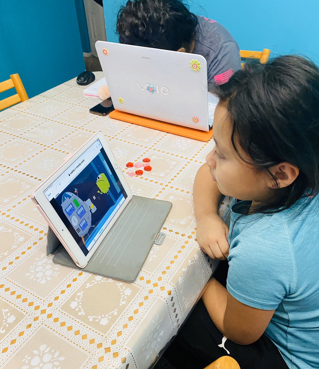 IlianaMR2's tweet photo. My princesses working online.  1st grade, 3rd grade 7th grade. https://t.co/5Q7Gf26O0R