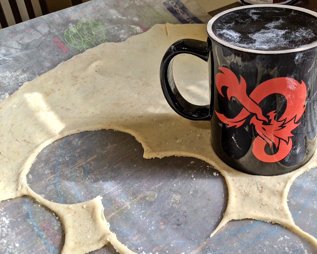 Step 7: Dough gets separated into manageable sections and rolled out thin with a bit of extra flour so it doesn't stick.Step 8: Use a wide glass, mug or circle template to cut circles.