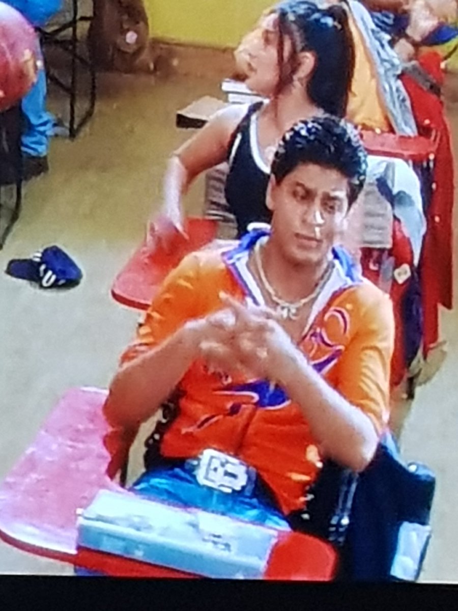 Rahul's attire is something else.  @iamsrk is sporting a bold orange  @speedo top. Watch out  @NarcosNetflix, bollywood did it first. Well, they tried. Not sure about a top that zips up at the stomach. Ambitious, nevertheless. He's still rocking that un'COOL' chain.  #KuchKuchHotaHai