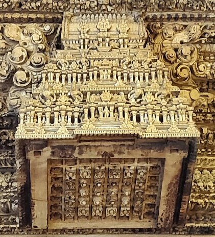 I think, this thing() is the miniature version of Viman, the flying chariot our gods used, also in our VastuShastra the shikhar part of any temple is called Viman, and if you look under this Viman you may notice lotus bud shapes under it... continue...