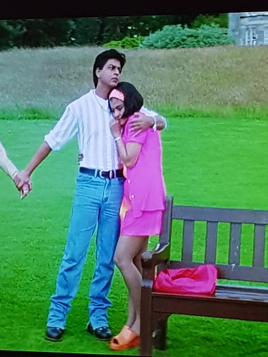 Not to be outdone, Anjali rocks up in a bright pink and orange number. I recognise the colour palette for the clothing in this film: I reckon they chose these colours from a set of highlighter pens - different gravy. A little more 80s than 90s, for me.  #KuchKuchHotaHai