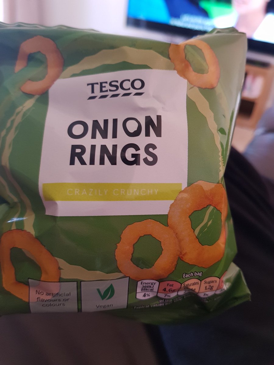 In keeping with the product placement/advertising in this film, my movie snack is brought to you by  @Tesco. Actually, my wife brought them to me. Anyway, it's a packet of their own-brand onion rings. Would it be rude of me to say this is the best bit of entertainment so far?