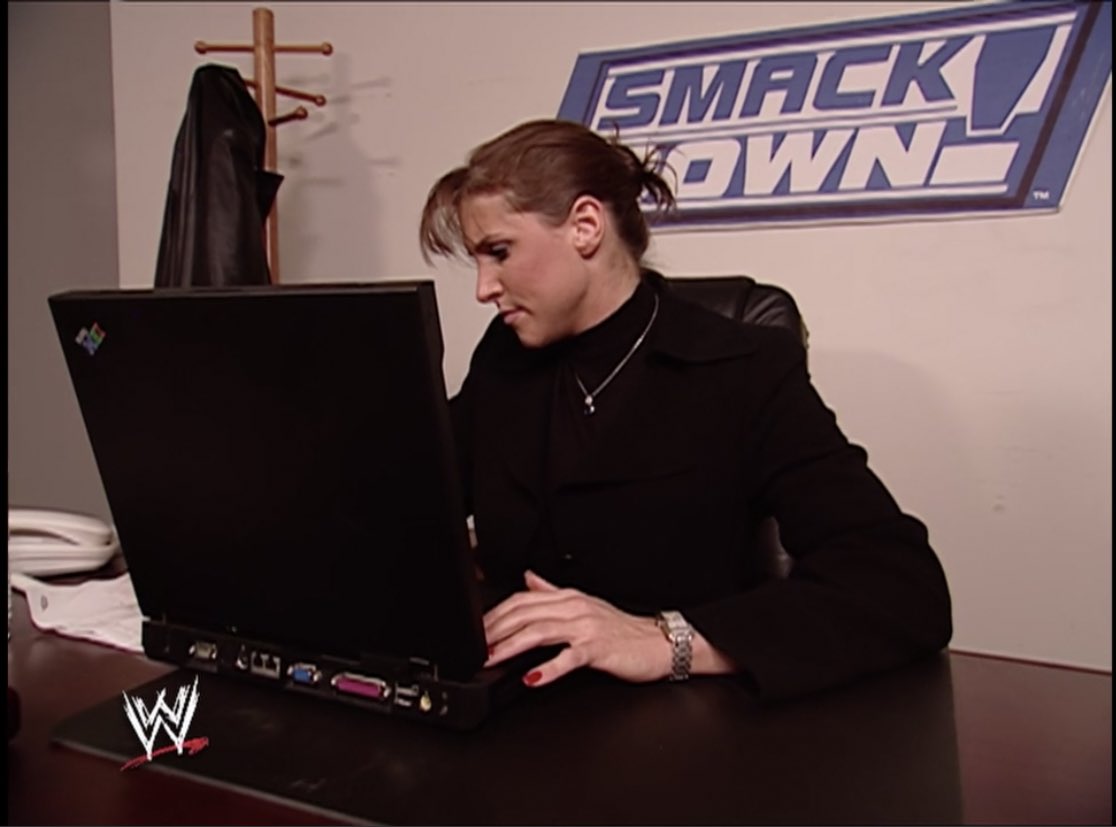 Stephanie McMahon’s hair and that laptop are in a fierce competition to look like the most 2003 thing ever   #SmackDown   3/6/03