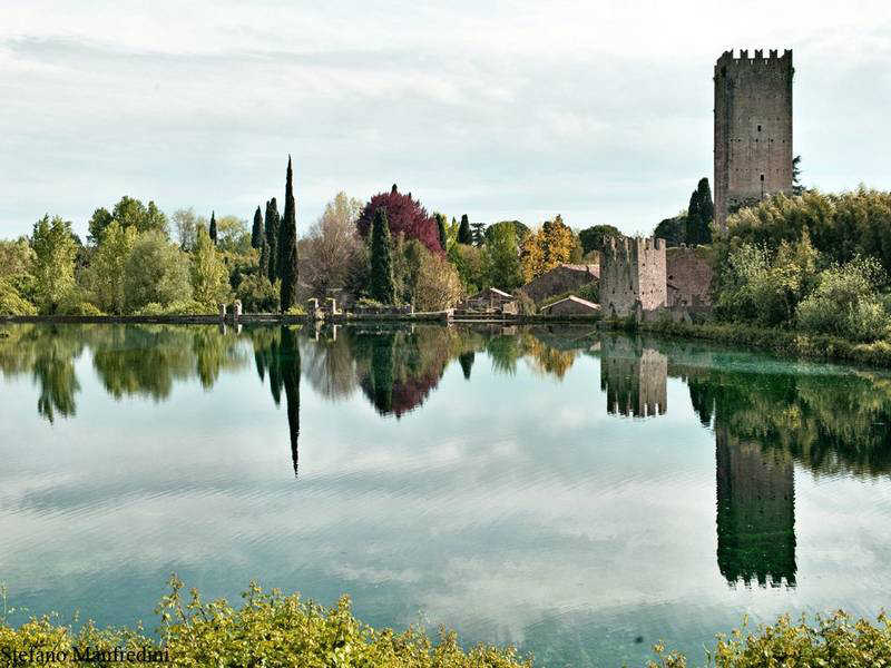 giardini di ninfa- gardens built on the ruin of medieval town ninfa in central italy- one of the most beautiful and romantic gardens in the world- the name 'ninfa' derives from a temple in the garden which is dedicated to the naiad nymphs