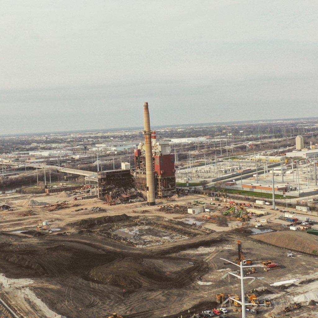 *TRIGGER WARNING* Aerial view photos of Little Village following the demolition earlier this morning of the concrete stack at the former Crawford Coal Plant Site.