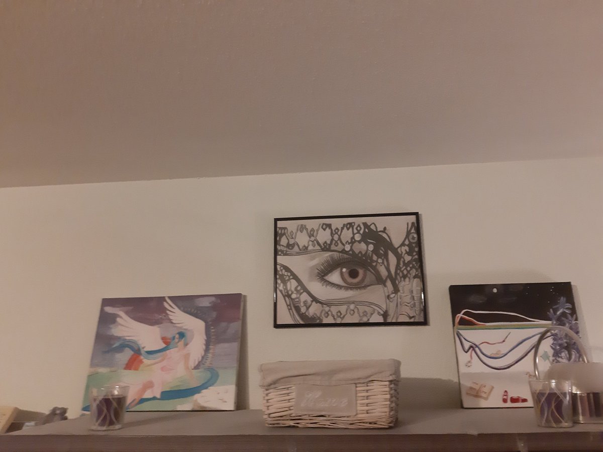  @AndreaKBrooks Then there's Katie & Ushy, a coloured drawing of my cat Gizmo. And 2 charcoal drawings or Rebekah from Vampire Diaries and a painting of Sara Canning (fun fact: first acryllic painting of a person and I didn't know how to blend haha). And 3 more on the cabinet 
