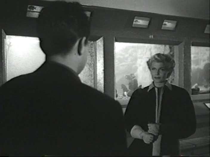 Of course the greatest scene shot in the old Steinhart Aquarium, before its 2004 remodel, is this encounter between Rita Hayworth & Orson Welles in the latter's 1947 The Lady From Shanghai. A mixture of on-set shooting & rear projection lends eerie power.  http://reelsf.com/lady-from-shanghai-aquarium