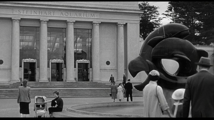 Skipping ahead to Don Siegel's 1958 The Lineup, an entirely-shot-on-location scene contextualizes the Aquarium within the Academy of Sciences (whose courtyard is shown) & near the Music Concourse & DeYoung Musuem. Even the SFPD mounted patrol gets a cameo.  http://reelsf.com/reelsf/the-lineup-steinhart-aquarioum-and-de-young-m