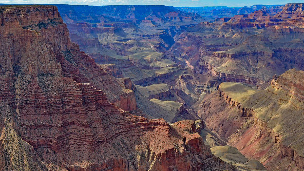 GrandCanyonNPS's tweet photo. Collisions between giant landmasses and flooding by ancient seas created Grand Canyon's rock layers. Squeezed between the Pacific Ocean floor and the Rocky Mountains, these layers rose to form high-elevation plateaus. Over time, the Colorado River carved this massive canyon. https://t.co/Uix7eJpcRb