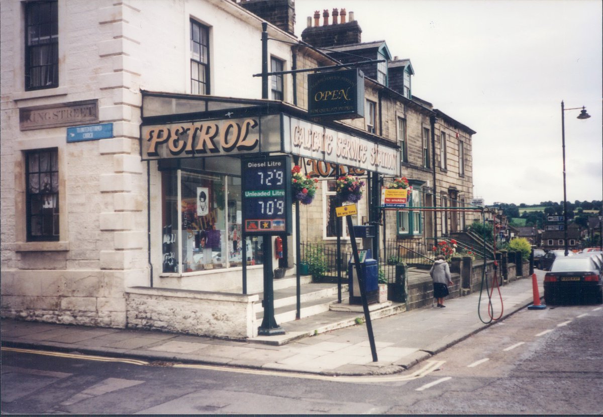 Day 110 of  #petrolstationsGalgate Service Station, Barnard Castle, Co Durham  https://www.flickr.com/photos/danlockton/16084695427/  https://www.flickr.com/photos/danlockton/16270562195/A 2-part garage, either side of the street on Barnard Castle's Galgate. Note the swing arms out over the pavement for the hoses. Unbranded—former Burmah