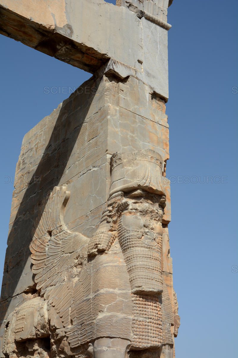 The text reads: A great god is Ahuramazda, who created this earth, who made Xerxes the great king of all countries. The son of Darius. By the favor of Ahuramazda this Gate of All Nations I built. Much else that is good was built in this Persepolis which I and my father built.