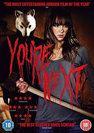 (You're Next 2011) A home invasion thriller with a twist. Sharon Vinson plays a complete badass survivalist as she fights her way through a deadly home invasion targeting her new family. Bloody, hilarious, and badass.