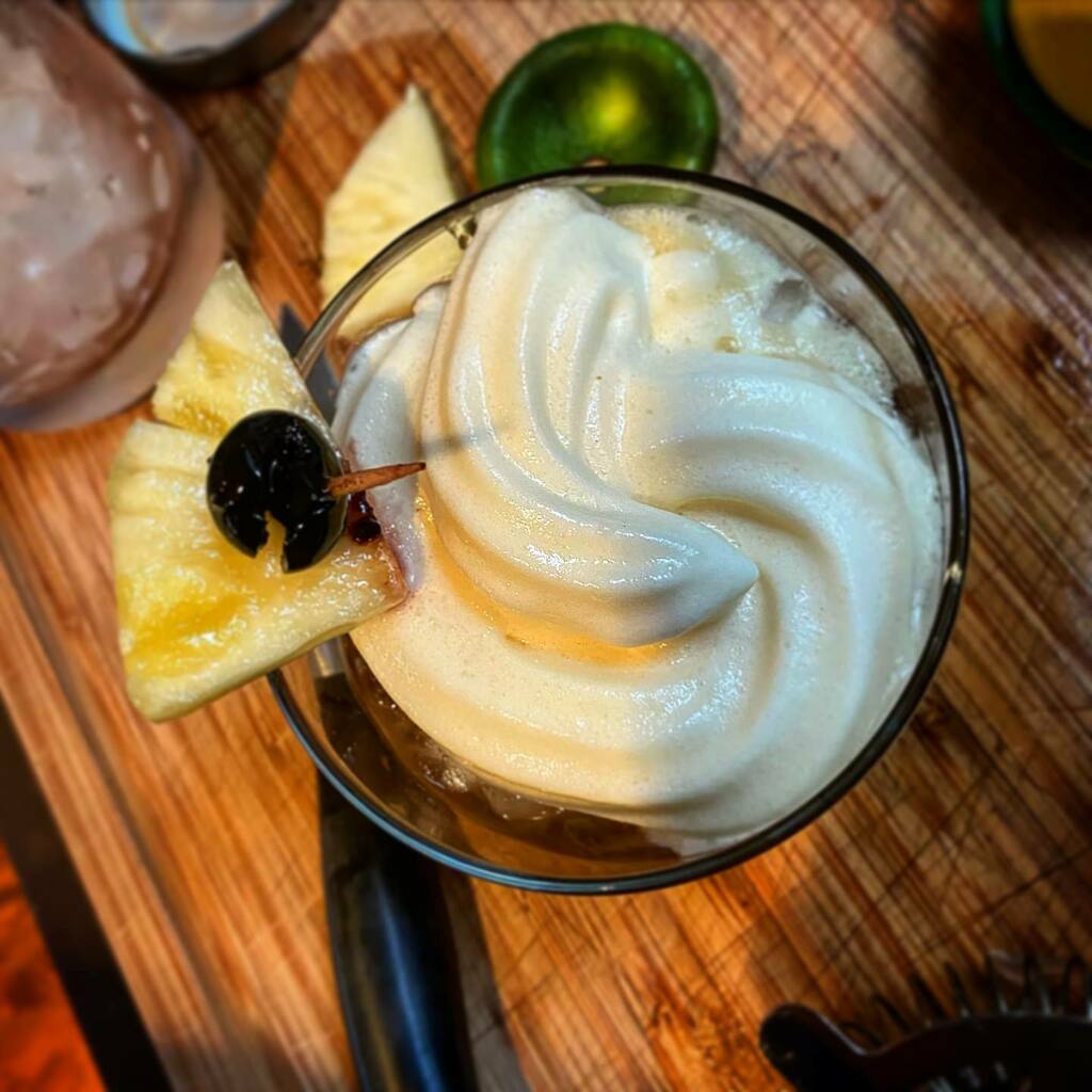 colum's tweet photo. Should have been in Maui this week. Not to worry - replicated the mighty #monkeypodkitchen #maitai at home instead. Cheers and aloha 🍹 https://t.co/FeXH8OfhyL https://t.co/ggOCNsuLin