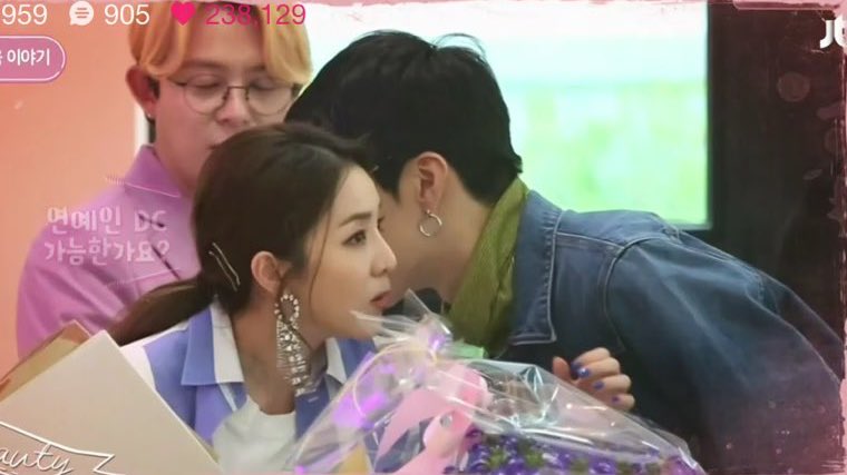 He’s always whispering something to his Dara noona. Plus their adorable height difference! 