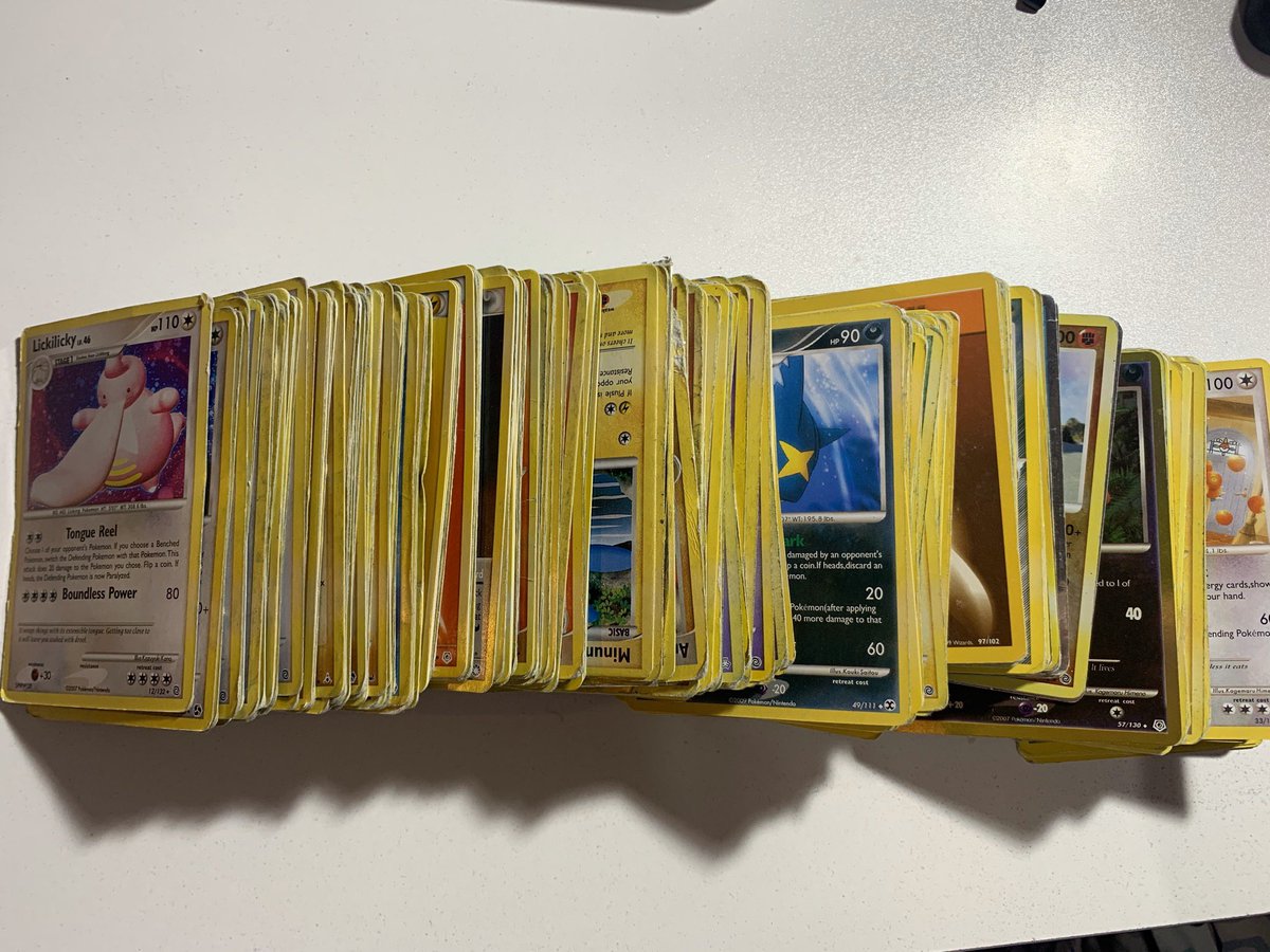 also found a phat stack of pokémon cards oh my these primary school memories are coming back