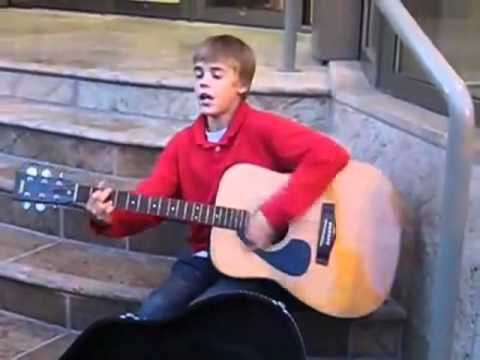 Moving on from his upbringing with his mom. He started to busk on the Avon theater at 12, all of the money he raised from just playing his guitar was to take his mom to Disneyland because they couldn’t afford to go.