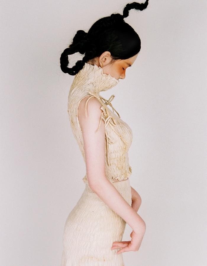 shiqixu // chinese - Shiqi Xu is a current student at Parsons Fashion Design Program and grew up in Chengdu, China. Taking inspiration from her culture as well as her own emotions, she creates interesting and unique silhouettes and pieces.
