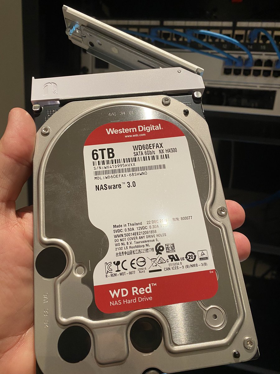 Snap a 6TB WD Red (bought separately) into the UDM’s caddy then just a single screw holds it in place. That’s now sitting in the unit and I’m calling it a night. Tomorrow I’ll start powering everything up and configuring it.