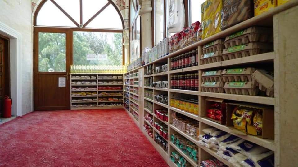 NazishMh's tweet photo. A young imam in Turkey transformed a mosque, closed during corona epidemic, into a "a market” with free food to help those in need. His slogan: "Take what you need, give what you can” - Sariyer, Istanbul https://t.co/Bja1870M20