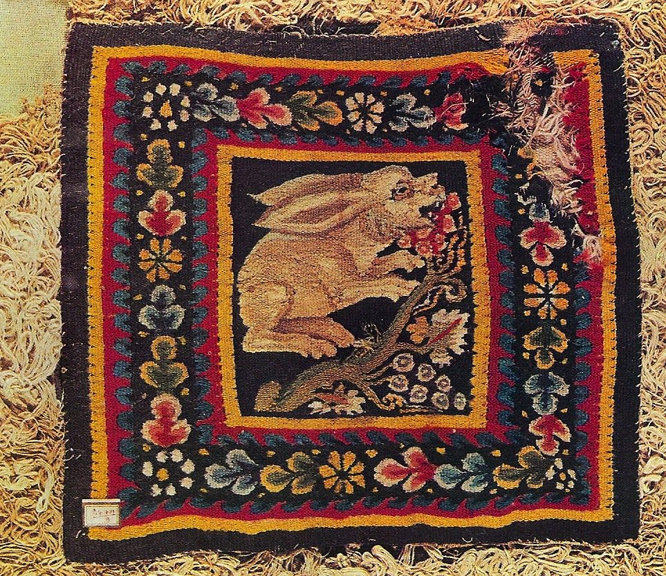 A 3rd- to 4th-century AD rectangular tapestry-woven panel of a hare, found at Faiyum, Egypt.