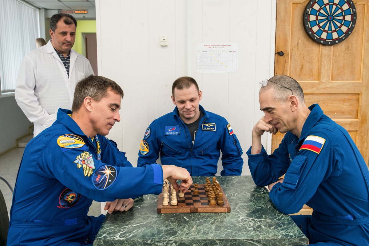 To celebrate the 50th anniversary of the first Cosmos - Earth chess game, the Museum of the Cosmonautics in Moscow is organizing a chess event that will give two people the chance to play against the cosmonaut Anatoly Ivanishin (playing back in this photo), currently on the ISS.