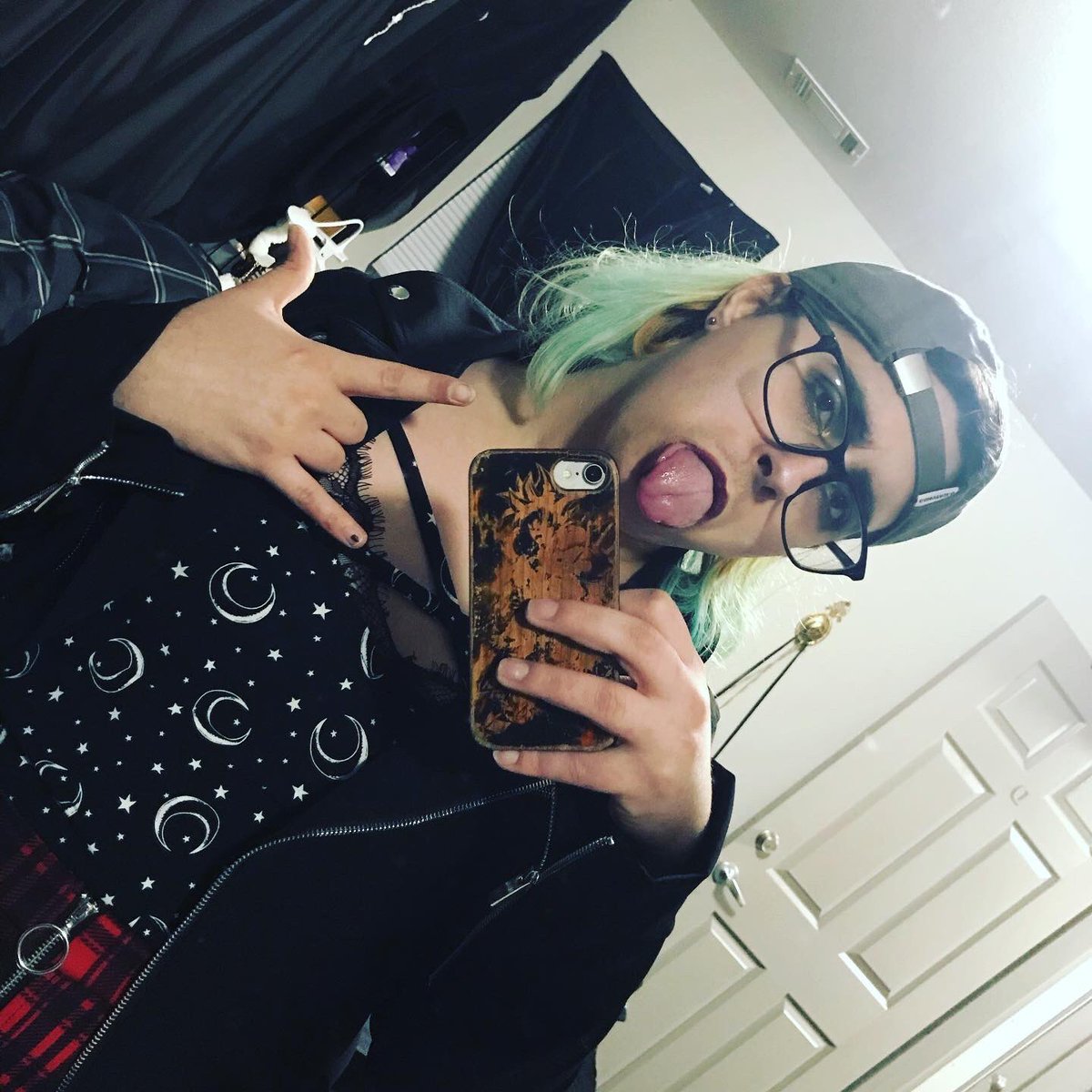 These next three are from the same look, but different vibes. I like this one because it was all “Fuck you I’m punk rock” and my tongue is on full display. It was just a fun, different selfie for me than my usual.