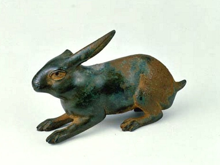 A 1st-/2nd-century AD Roman crouching hare, possibly an attachment from a piece of furniture:  https://vads.ac.uk/large.php?uid=750&sos=14